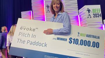 Beef in Australia's Pitch in the paddock winner, Dr Bronwyn Darlington from Agscent, with her prize money. Photo Andrew Marshall.