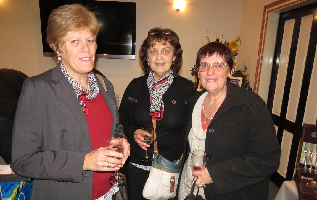 Trio: Rae Mohi, Lena Hinsley and Kathy Pollard all together at the auction after hours event last Friday. evening at Purslowe Tinetti Funerals.