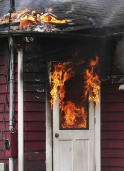 Fire: The home ablaze.