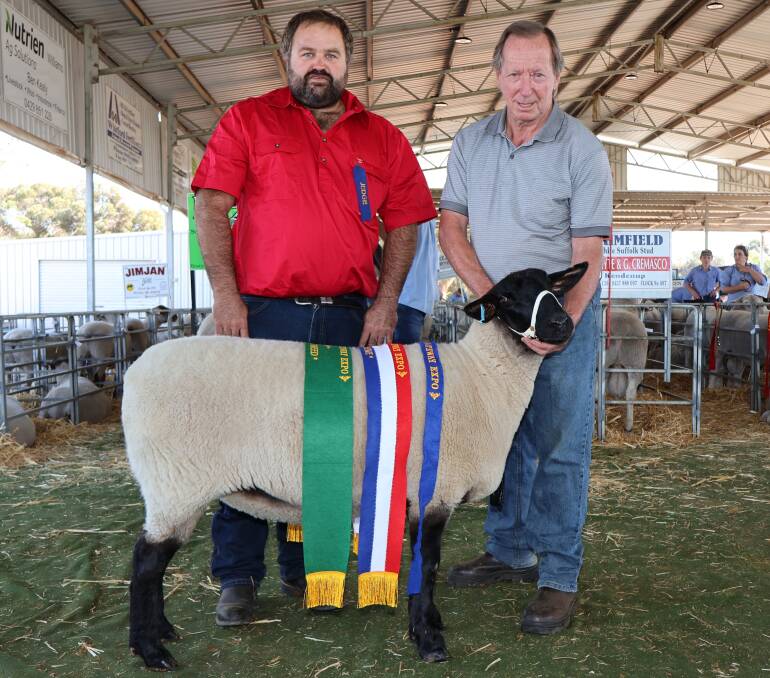  With the grand champion Suffolk and champion Suffolk ewe exhibited by the Goldenover stud, Cuballing were judge Aaron Foster (left), Wendenlea Suffolk and White Suffolk studs, Boddington and Goldenover principal Ray Batt.
