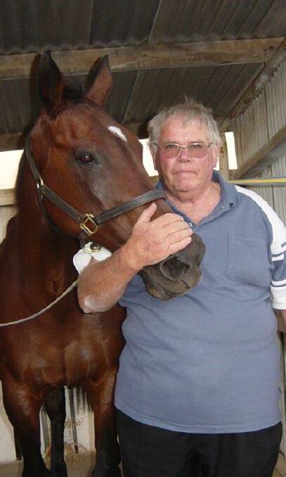 Village Kid with trainer Bill Horn, February 2004.