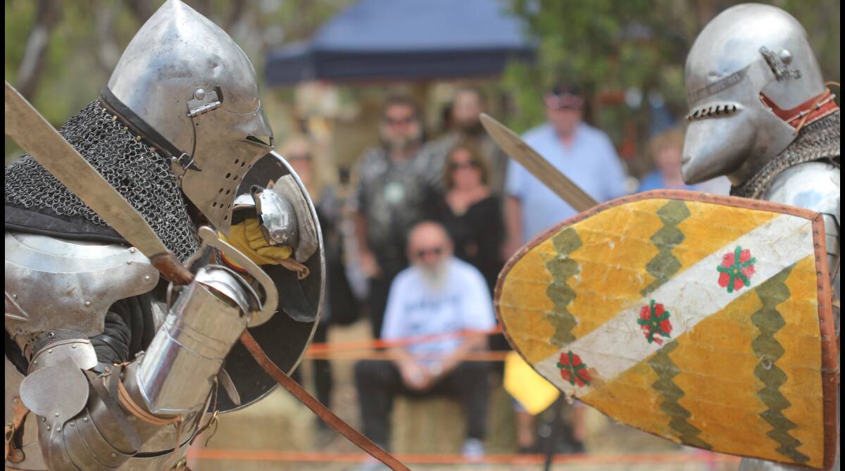 Knights in shining armour: Adorned in metal, protection gear and ready for a battle at last year's York Medieval Fayre - a taste of what to expect this year. 