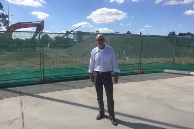 Developer and owner of the new shopping complex Greg Pearce in front of the building site on Gairdner St, Northam.   