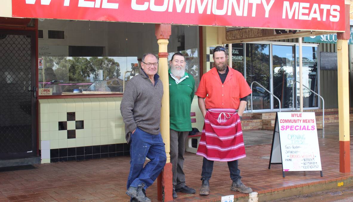 Wylie Community Meats is open for business with Quentin Davies (left), Simon Pontifex and Brad Phillips in front of the refurbished store on Wyalkatchem's main street.