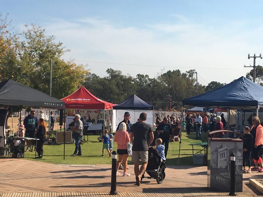 Out and about: It was a busy day on Saturday morning at the Northam Farmers' Market with families buying fresh produce for the week, getting their morning coffee and purchasing local handmade items. 