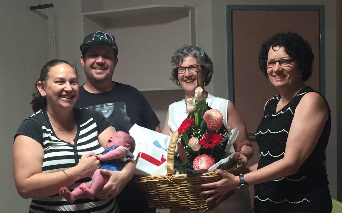 Supported family: (L-R): Liz Osborne with baby Thomas John and husband Jeremy, midwife Marie Hill and midwife Judi Turner.