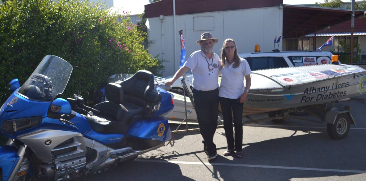 Hope in a boat: Team Leader Glen Hurst drives the Honda Goldwing and Lion Marina Ruranga drives the support vehicle.