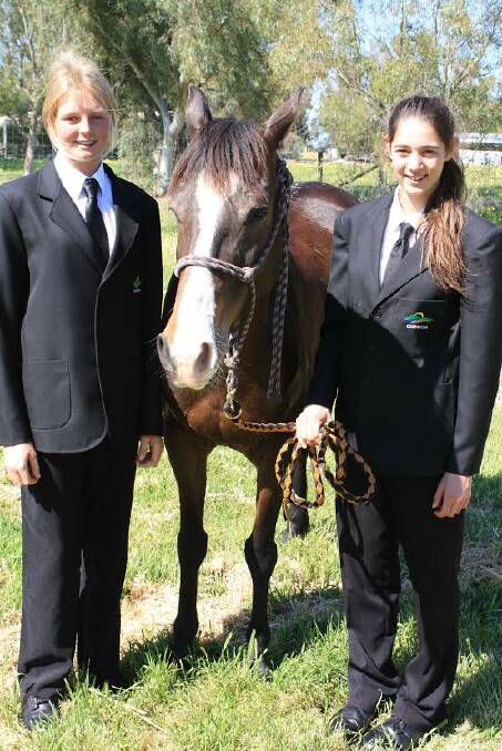 Students: Jemma Read (right) and her horse Misty, with Jessica Herzer who will compete in the Prince Philip Mounted Games at this year's Perth Royal Show.