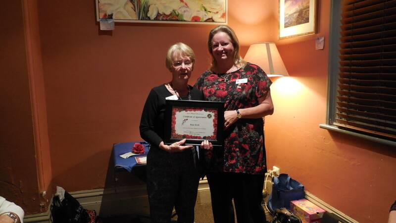 Hand over: Debbie presenting Kaye with her certificate.