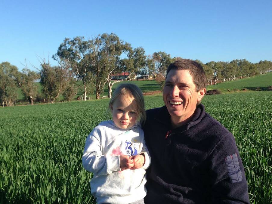 Greenhills farmer: Simon Penny, pictured with his daughter Amelia in a paddock of Mace wheat, uses the variety for all of his wheat program.