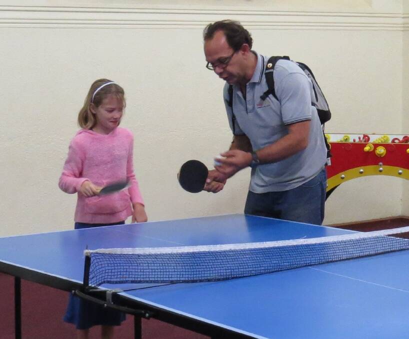 Instruction: Avon Youth's Michael Ward imparts some table tennis tips.
