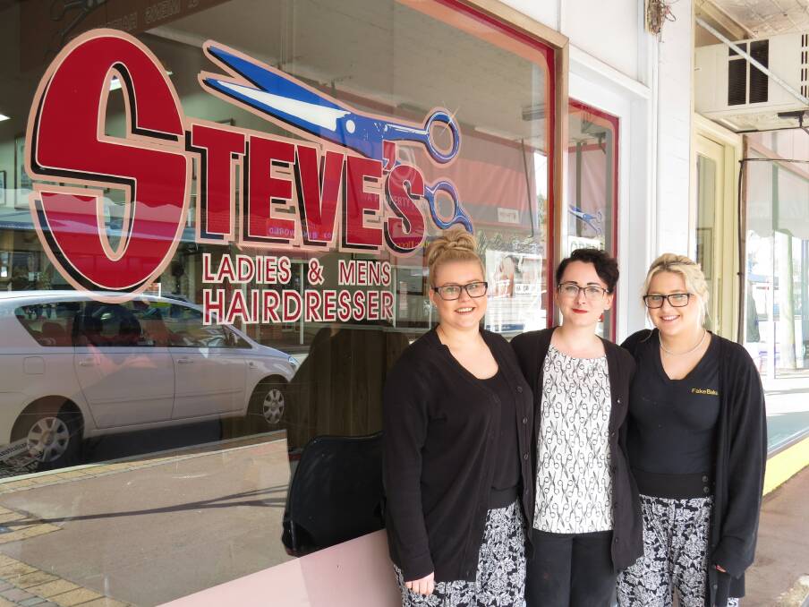 New home: Katelyn Dunning, Brittny Nunn and Lisa Rogers of Hall and Jones Hair Stylists outside their temporary premises.