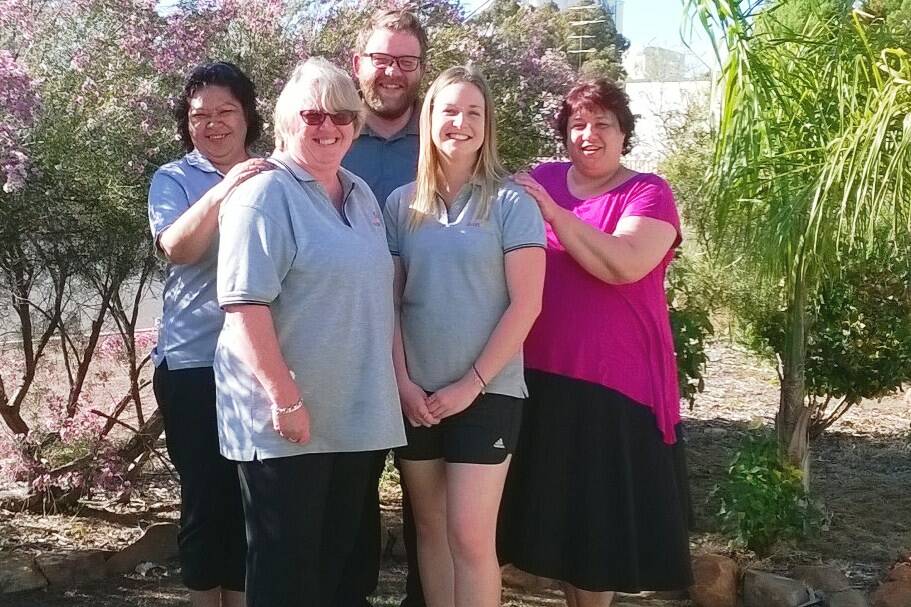 Celebrating: Avon Youth Community and Family Services staff members Suzie Dean, Wendy Meechan, Joseph Fitch, Anna McCullough and Venessa Miler are all smiles after the service was named a finalist in the WA Youth Awards.