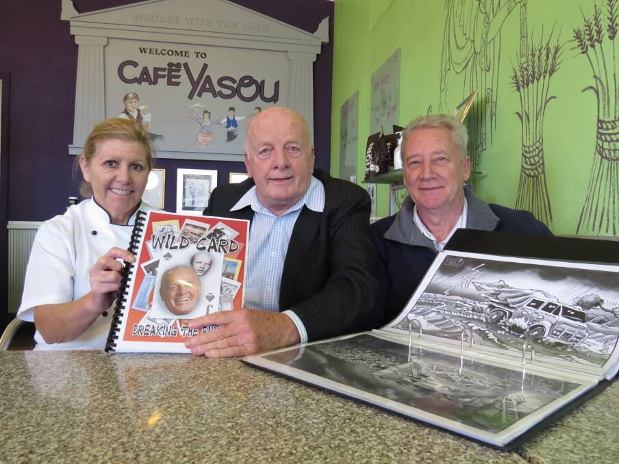 Pictured: Anne Ryan of Cafe Yasou and Ron Seddon with Jack (who is usually to be found in Yasou each morning) admiring the work so far achieved by the duo.