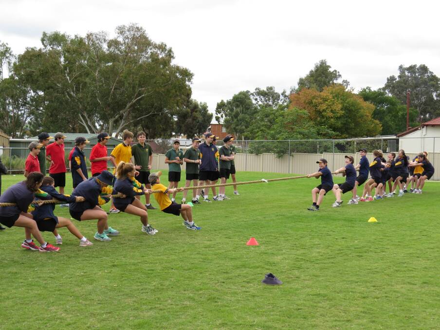 Battle: Tug of War last Thursday afternoon during celebrations of St Joseph s School's Founders Day.