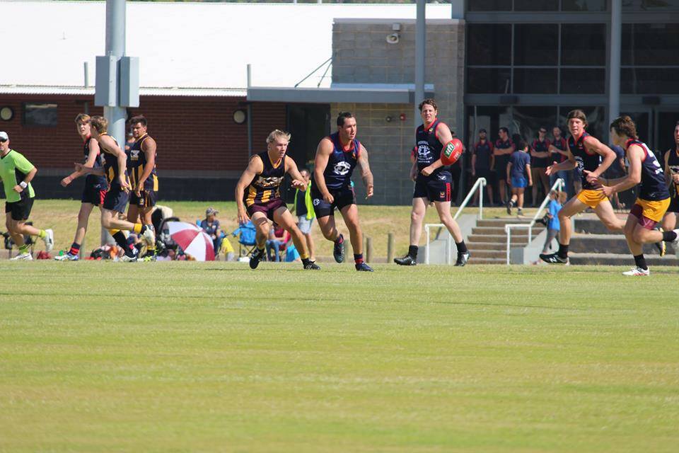 Big win: Federal Reserves running hard in their convincing 59-point victory over the York Roos. Photos: supplied.