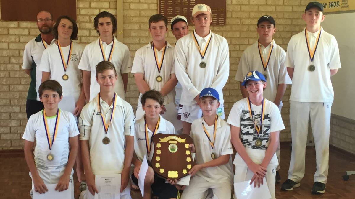 Shield winners: St Joseph's under 16's cricket team enjoy their win after taking out the 2015/16 grand final against Northam Senior High School.