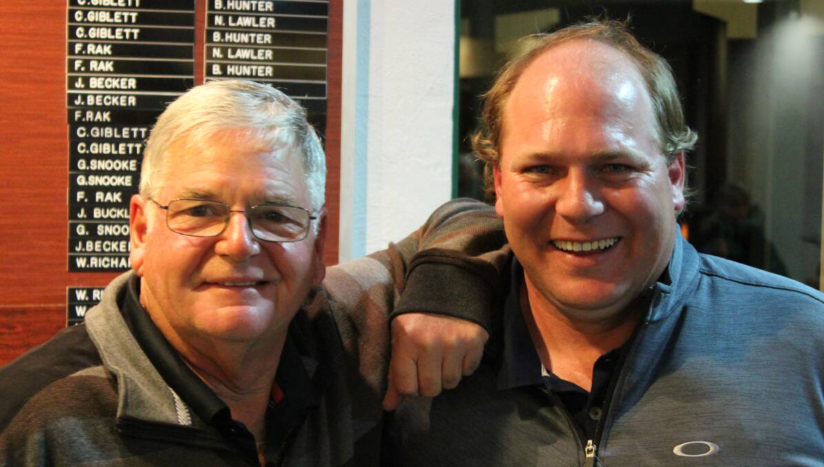 Winners are grinners: Winners of the 36-hole Traders trophy Bob Allert and Cam Evans.