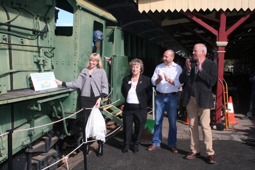 Opening: Member for Central Wheatbelt Mia Davies unveils the plaque to open the improvements to Old Northam Railway Station, watched by Northam Heritage Forum chairwoman Genny Budas, Simon Dempster of Splice Projects and Ian Gibbs of W Gibbs and Son.
