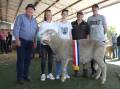 With the champion autumn shorn exhibit Poll Merino ram from the Lewisdale stud, Wickepin, at this years Act Belong Commit Williams Gateway Expo were Lewisdale stud connections Ray Lewis (left), Rebecca and Brooklyn Matthews, John Bushby and Ashley Dowey.