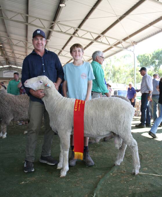 The reserve champion autumn shorn ram was exhibited by the Eastville Park stud, Wickepin. With the Poll Merino ram were Eastville Park stud co-principal Grantly Mullan, Wickepin, and his son Hugh.