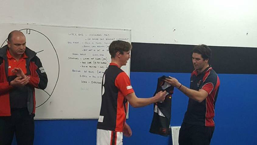 Federal League coach Alistair Smith presented the Perth Football Club League jumper to Shaun Smith at his first game on July 8. 