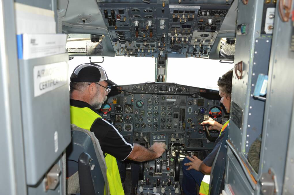 Up, up and away: Andrew and Mary Cotterell take a look inside the cockpit of one of the Boeing 737s bound for York. Photo: Supplied.