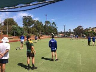New turf: Students from Toodyay District High School learning lawn bowls. Photo: Supplied. 