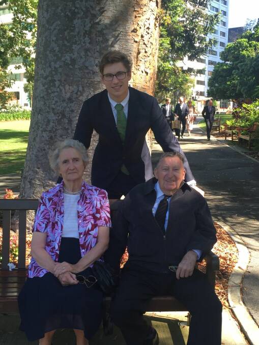 Proud family: Charles Dallimore, centre, with grandparents Hazel and Eric Dallimore at the Supreme Court Gardens in Perth. Photo: Supplied.
