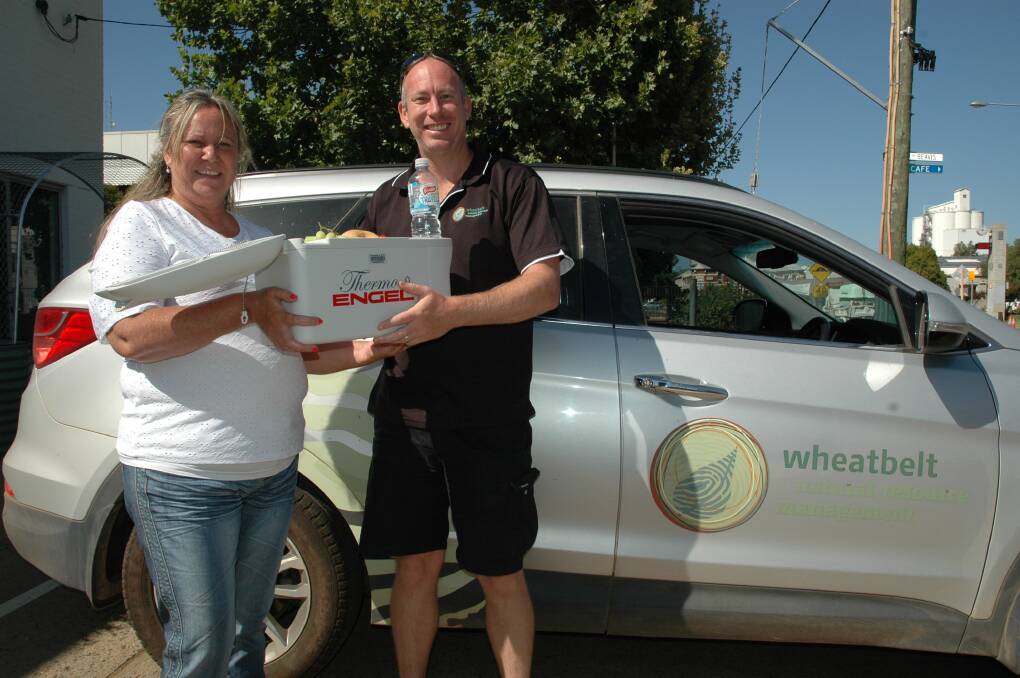 Wheatbelt Natural Resource staff, Michelle Winmar and Chris Kennedy with one of their new vehicle fridges purchased with Healthier Workplace WA grant funding.