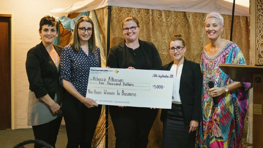 Bec Atkinson, second left being awarded the inaugural Northam Women in Business bursary cheque. 