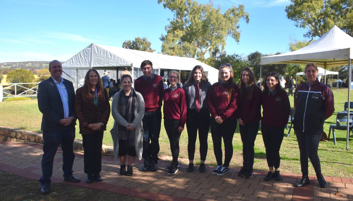 College return: Former Muresk Insitute student Amy Corsini with Central Regional TAFE School of Agribusiness head professor Christine Storer and her students from Narrogin. Photo: Supplied.