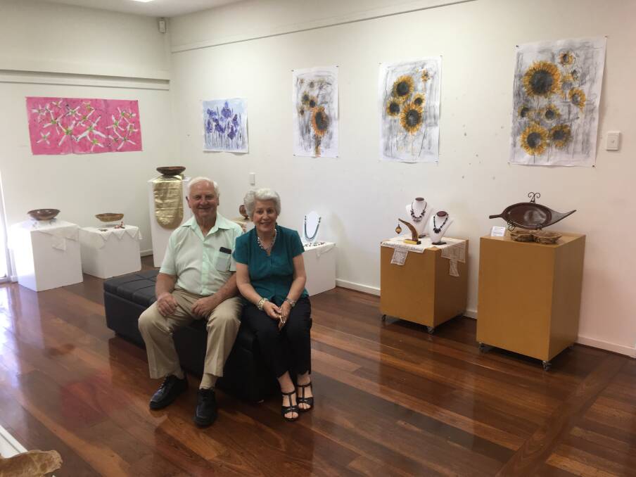 Artists: Mick and Jenny Cotter with their display. Photo: Supplied.