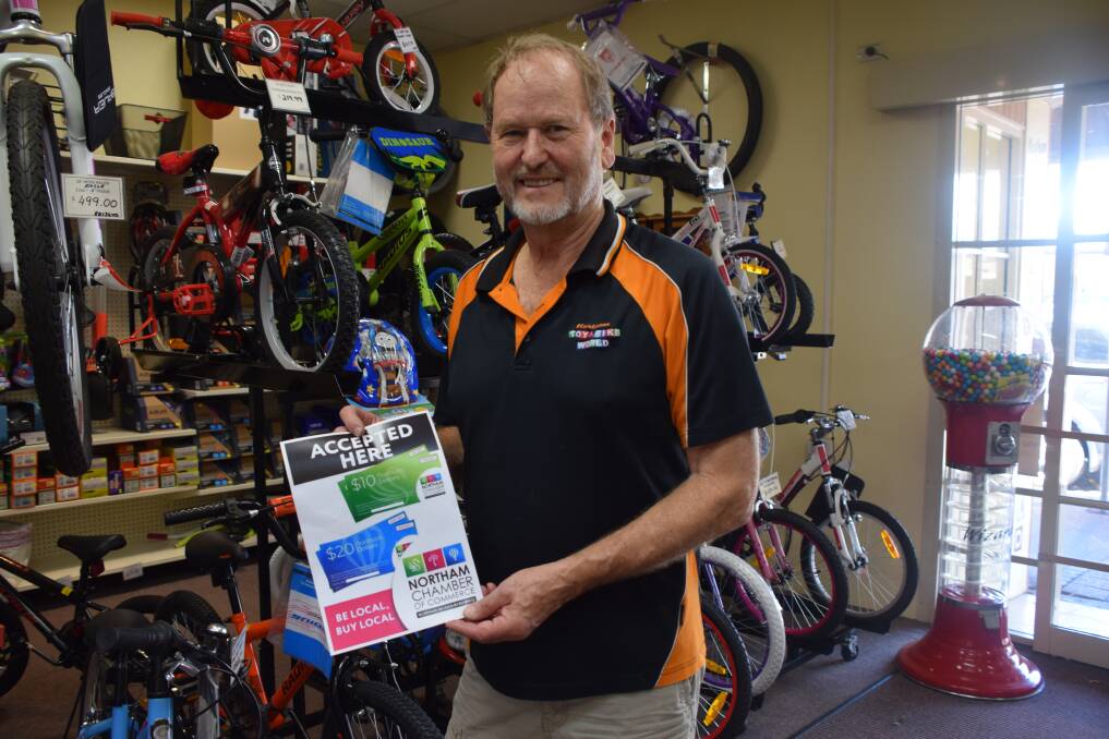 Northam Toy and Bike World owner Allan Newton is one of the supporters of Northam dollars around town.  