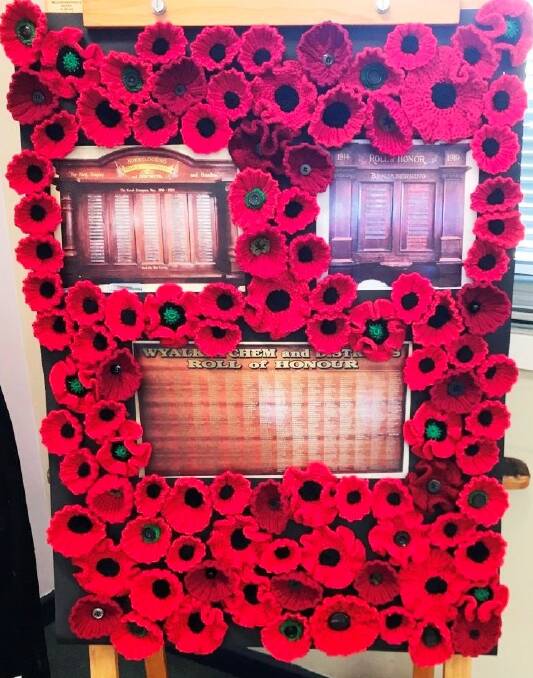 Poppies surrounding photos of the Wyalkatchem and Districts RSL Honour Boards
