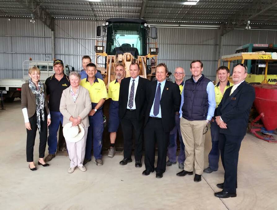 Launch: Mia Davies poses with councillors, staff and visitors at the opening of the shire depot.