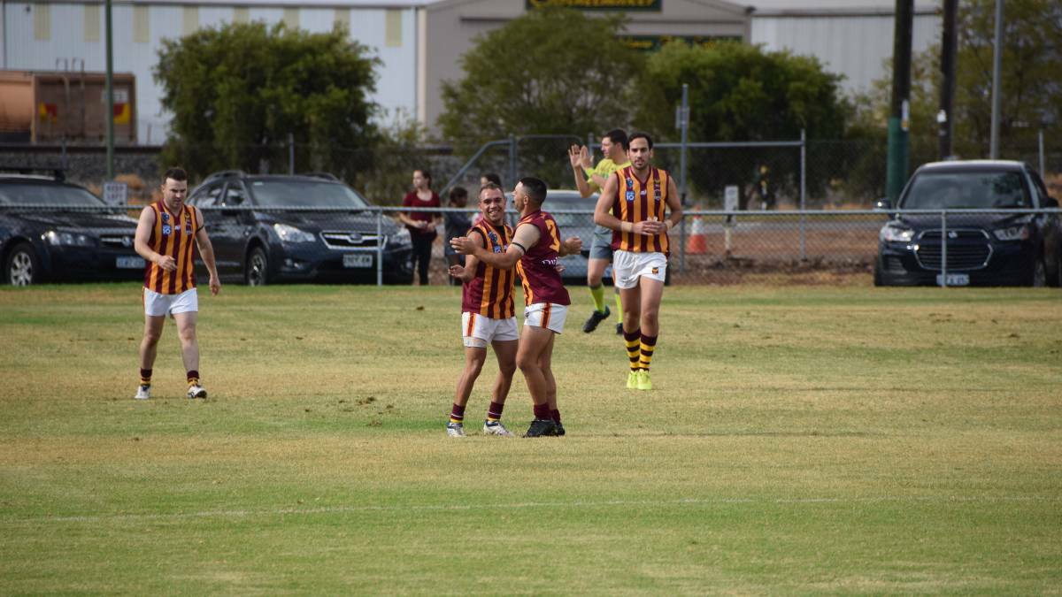 Better weather: Railways players during their derby clash with Federals in April. Photo: supplied.