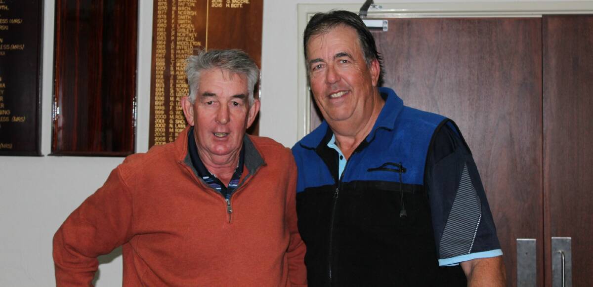 Monthly mugs: Runner-up Phil Becker with worthy, if somewhat surprised winner, Don Bates. Photo: supplied.