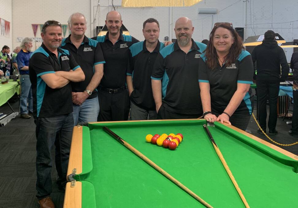 Eight-ball team: Gavin Fisher, Kevin Wells, Rick Kennedy, Leon Wilcox, David Gill and Tania Davey. Photo: Supplied.