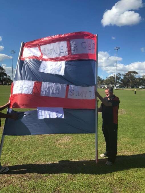 Marking milestones: The Federals Football Club celebrated a number of significant events last weekend, including coach Alistair Smith's 100th game and Kane Robinson playing his 200th game. Photo: Dianne Robinson. 
