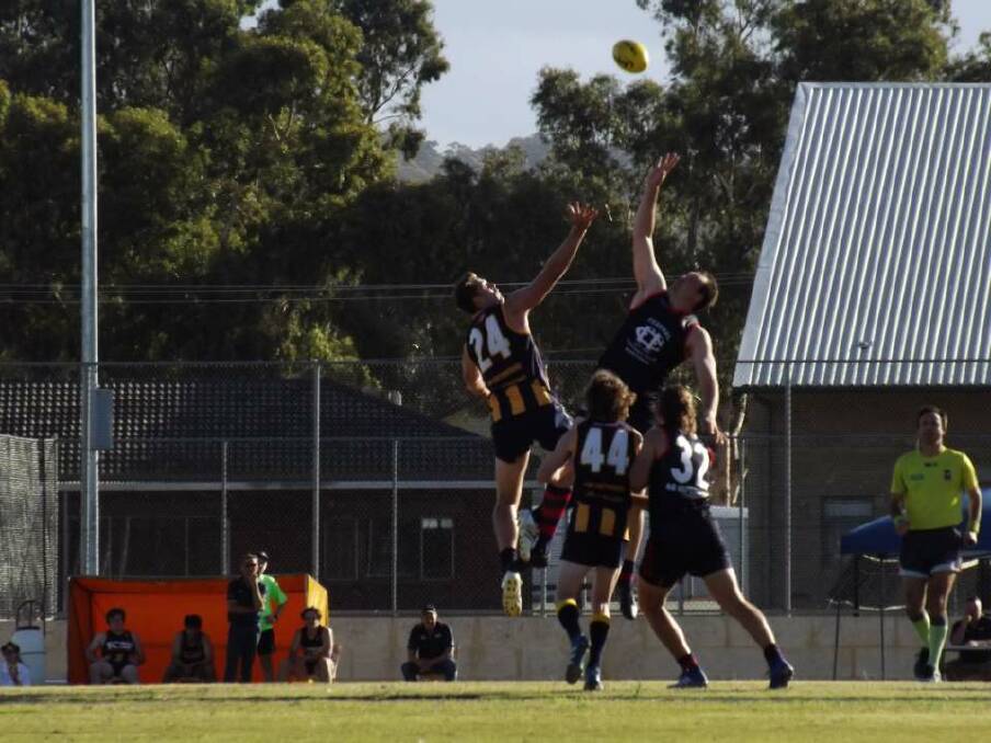 Flying high: Federals' League boys battle it out in the ruck against the York Roos on Sunday, May 5. Photo: Katherine Burges.