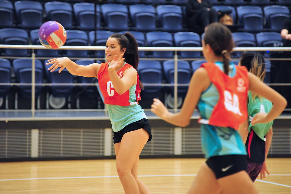 On the court: Players during the pilot programs at the State Netball Centre in Belmont earlier this year. Photo: supplied.
