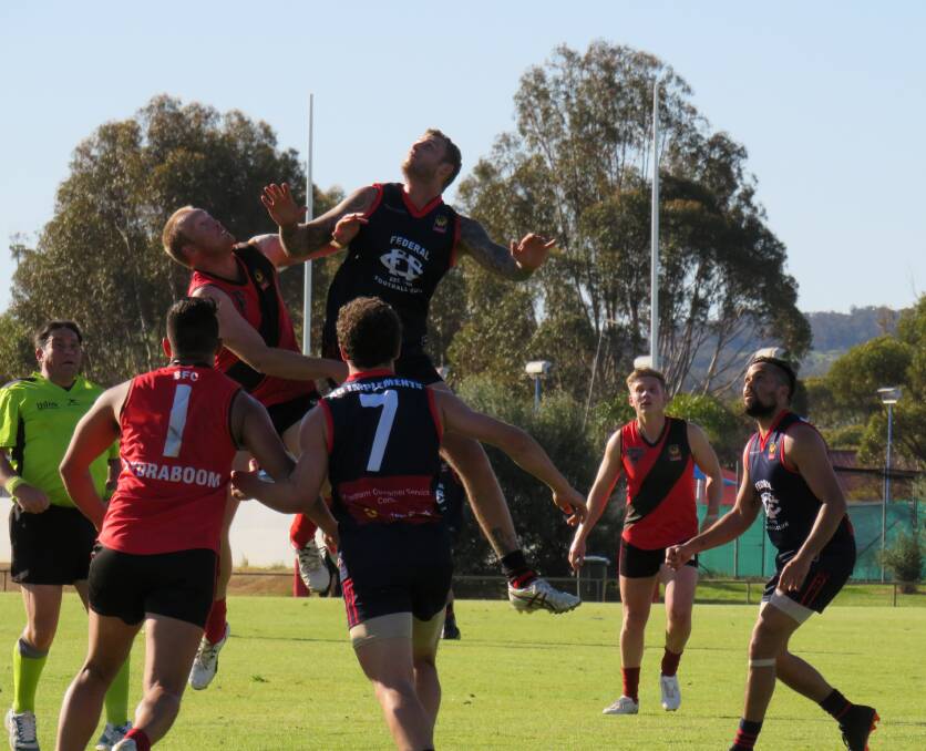 Flying high: Alistair Smith launches himself for a mark in last Sunday's preliminary final against the Beverley Redbacks. Photo: Kathy Burges.